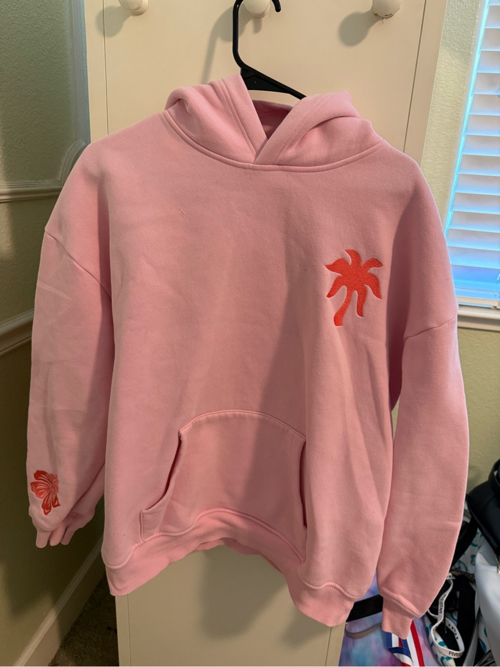 Pink Pullover Hoodie with Orange Palm Accent